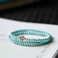 Ho - Bracelet/Collier Turquoise