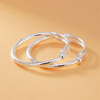 shizu-paire-bracelets-cheville-pour-bebe-floral-argent-massif-vue-profil
