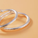 shizu-paire-bracelets-cheville-pour-bebe-floral-argent-massif-detail