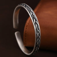 bracelet-jonc-ouvert-argent-massif-motif-tresses-kai-detail